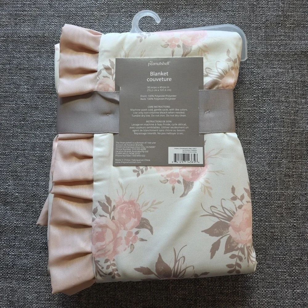 The Peanut Shell Cream Pink Rose Print Satin Back Ruffle Trim Baby Blanket